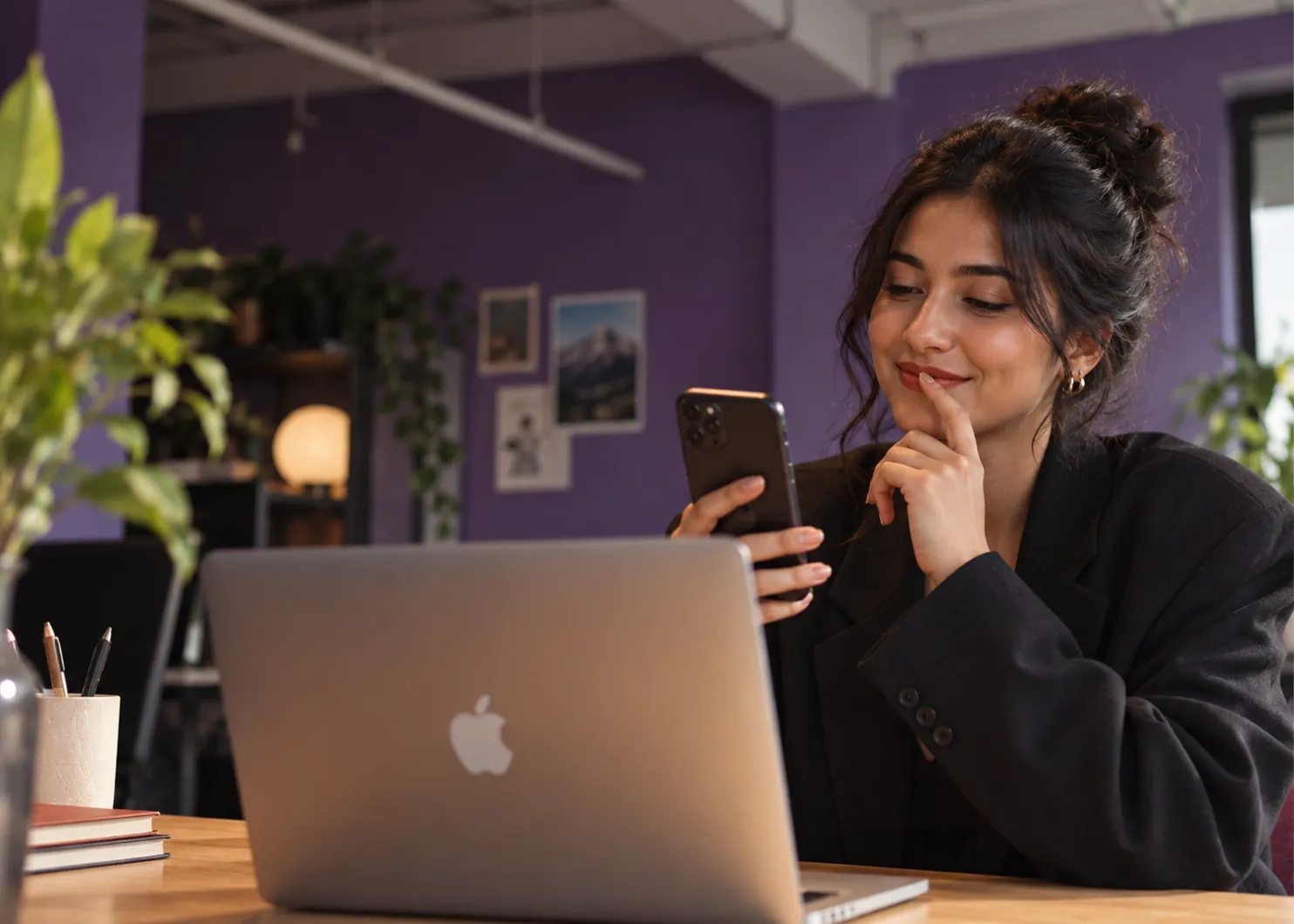 Agency owner managing client conversations from her phone